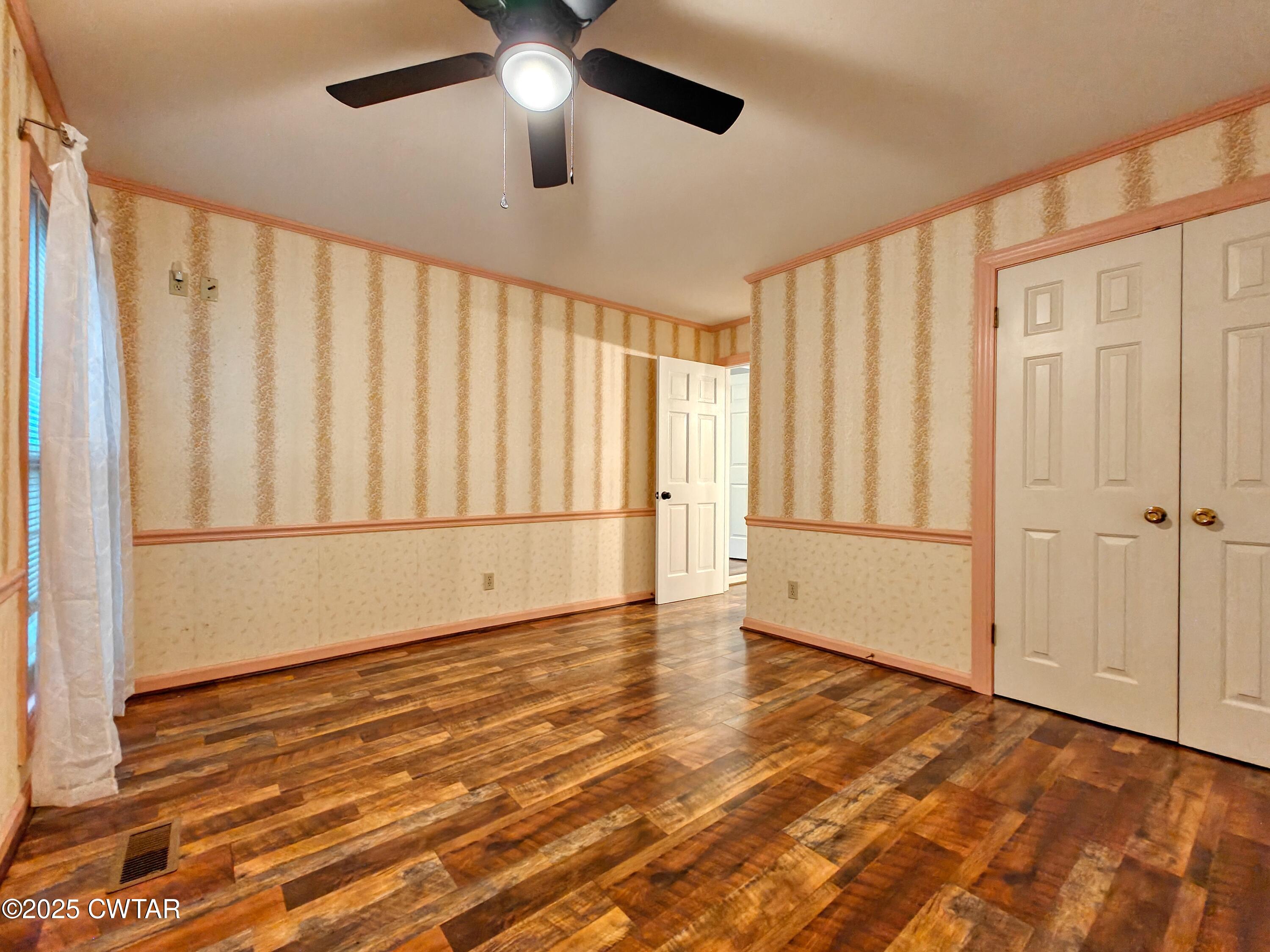 260 Cotham Drive Huntingdon, TN 38344 - Photo 25 of 29 a view of an empty room with a window