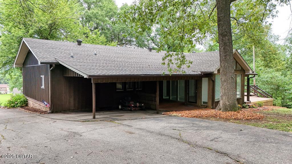 260 Cotham Drive Huntingdon, TN 38344 - Photo 7 of 29 a view of a house with a tree in front of it