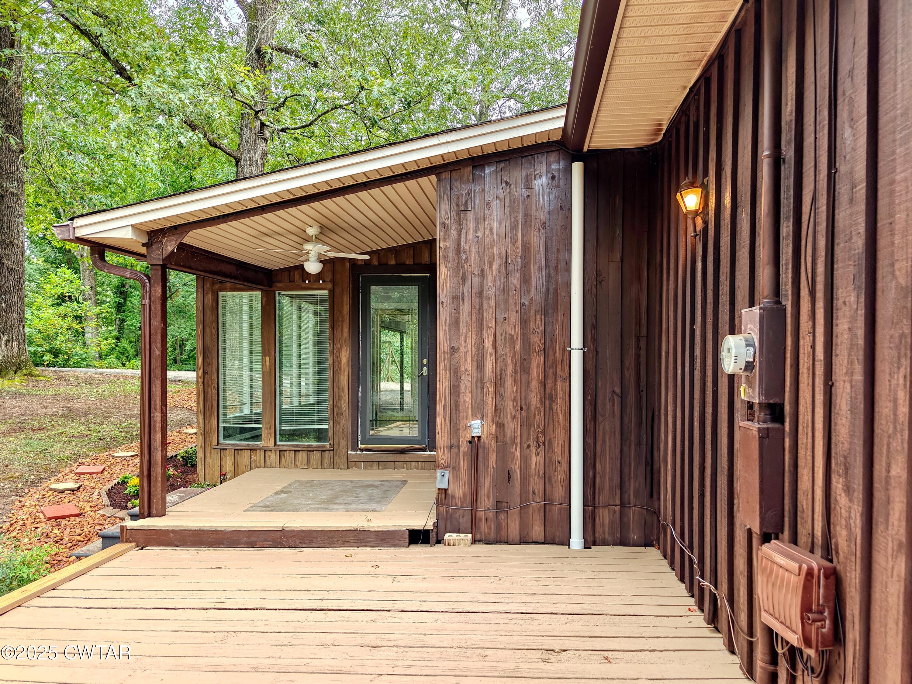 260 Cotham Drive Huntingdon, TN 38344 - Photo 8 of 29 a view of a house with a patio