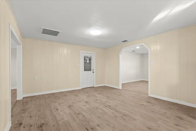 a view of a yard with an ocean view