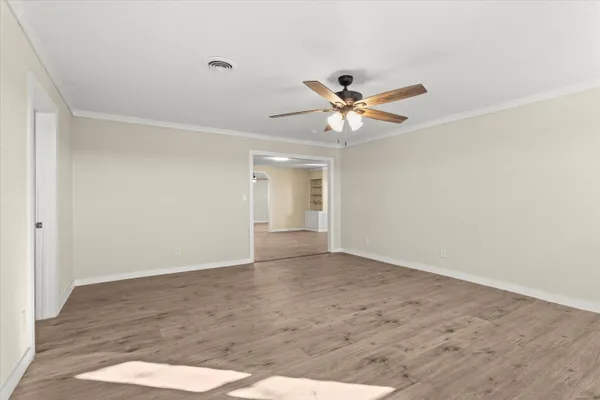 a view of an empty room with a window