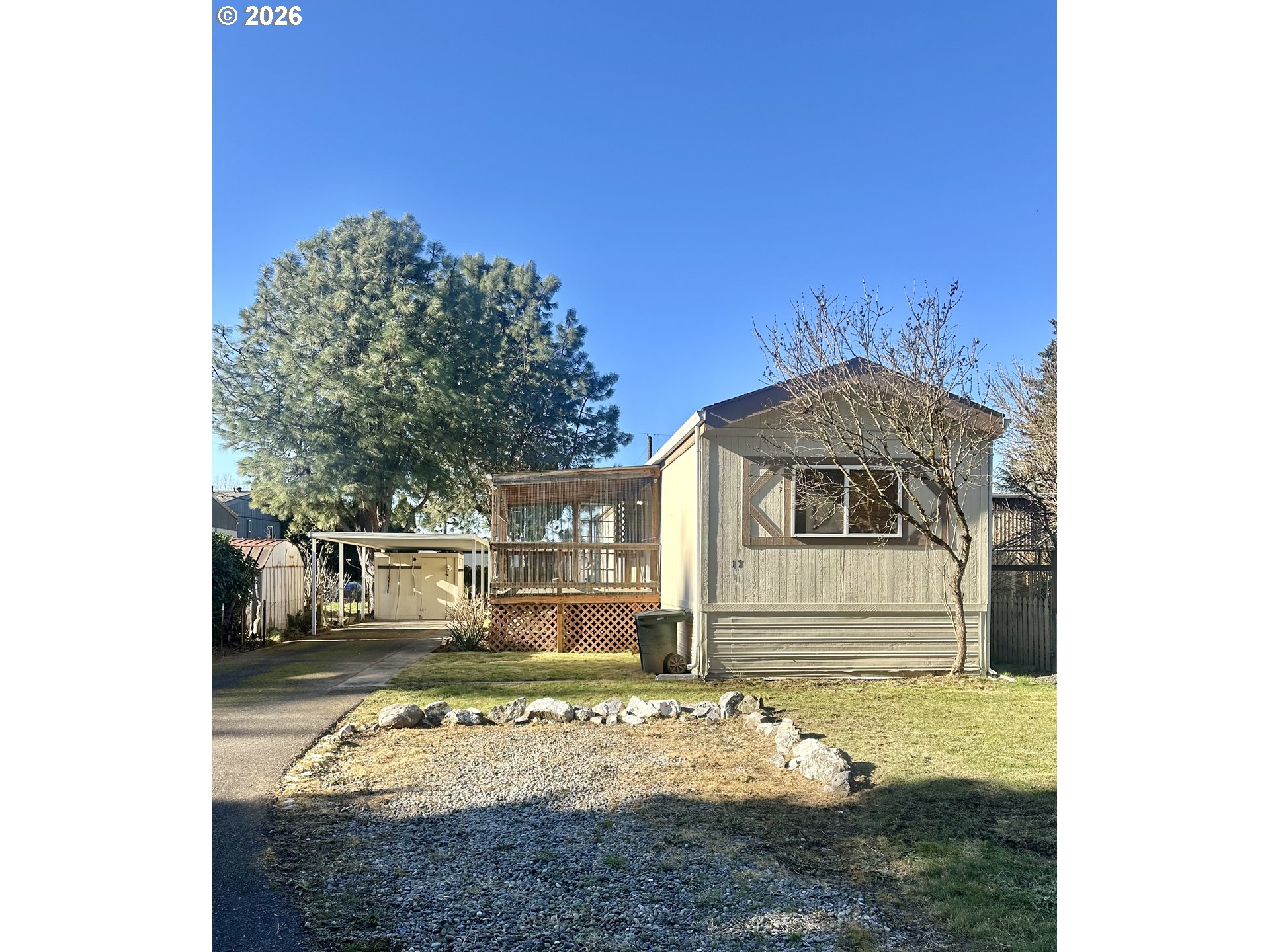 2009 Lewis River Road, Unit 17 Woodland, WA 98674 - Photo 2 of 32 a house view with a outdoor space