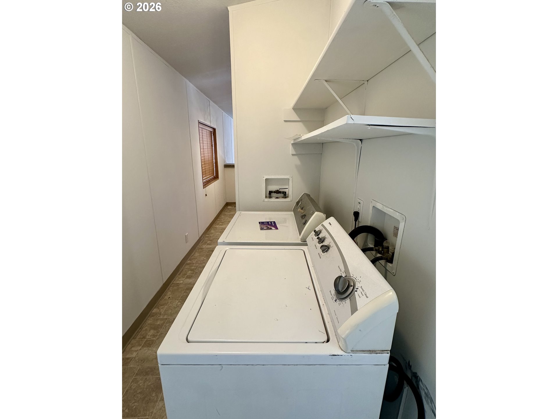 2009 Lewis River Road, Unit 17 Woodland, WA 98674 - Photo 25 of 32 a utility room with dryer and washer