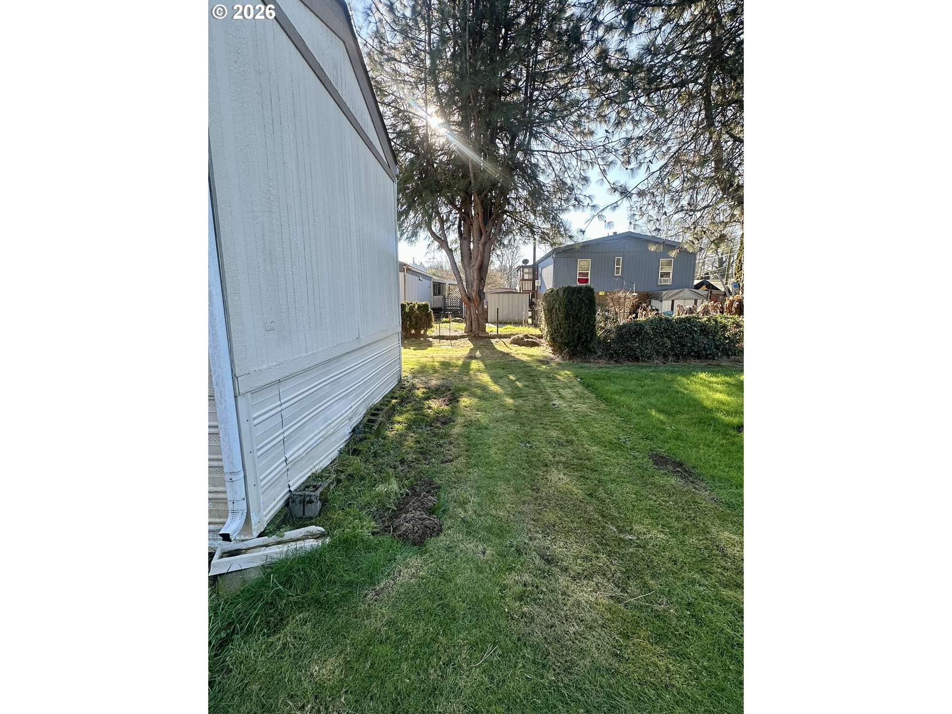 2009 Lewis River Road, Unit 17 Woodland, WA 98674 - Photo 32 of 32 a view of a back yard of the house