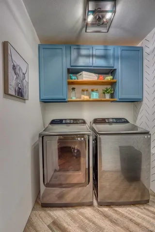 a stove top oven sitting inside of a kitchen