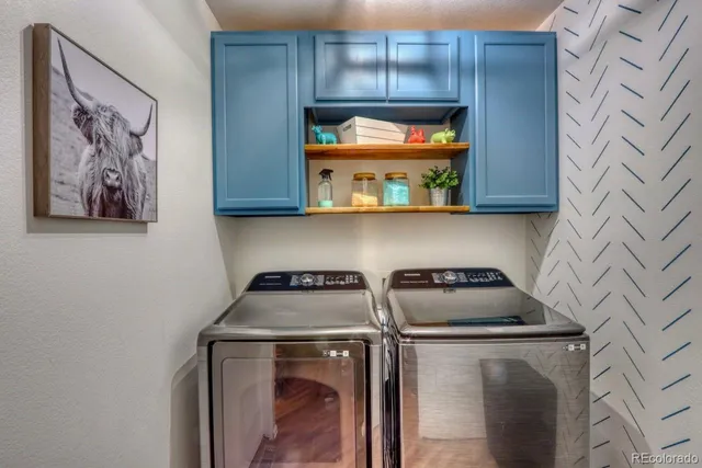 a kitchen with a stove and a microwave