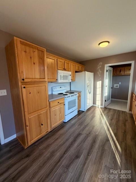 4715 Horseshoe Bend Road Hudson, NC 28638 - Photo 8 of 18 a kitchen with stainless steel appliances a refrigerator and cabinets