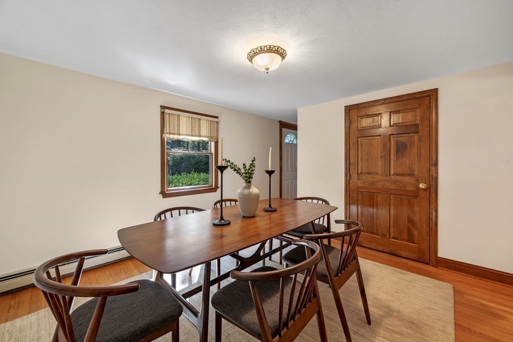 118 Herrick Road Boxford, MA 01921 - Photo 13 of 42 a dining room with furniture and window