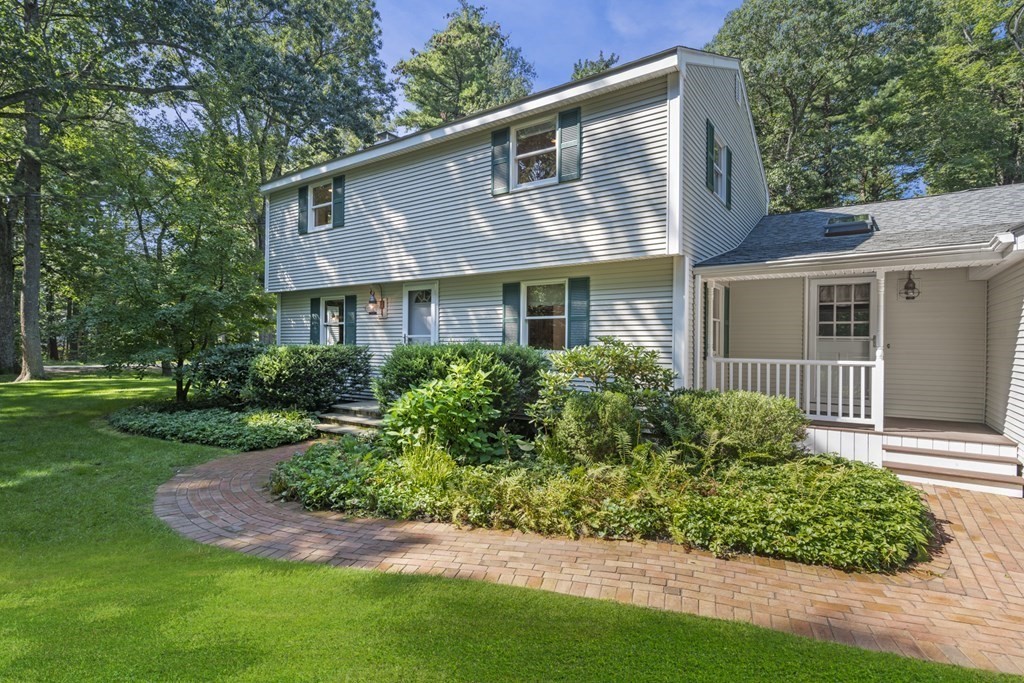 118 Herrick Road Boxford, MA 01921 - Photo 2 of 42 a front view of a house with a yard