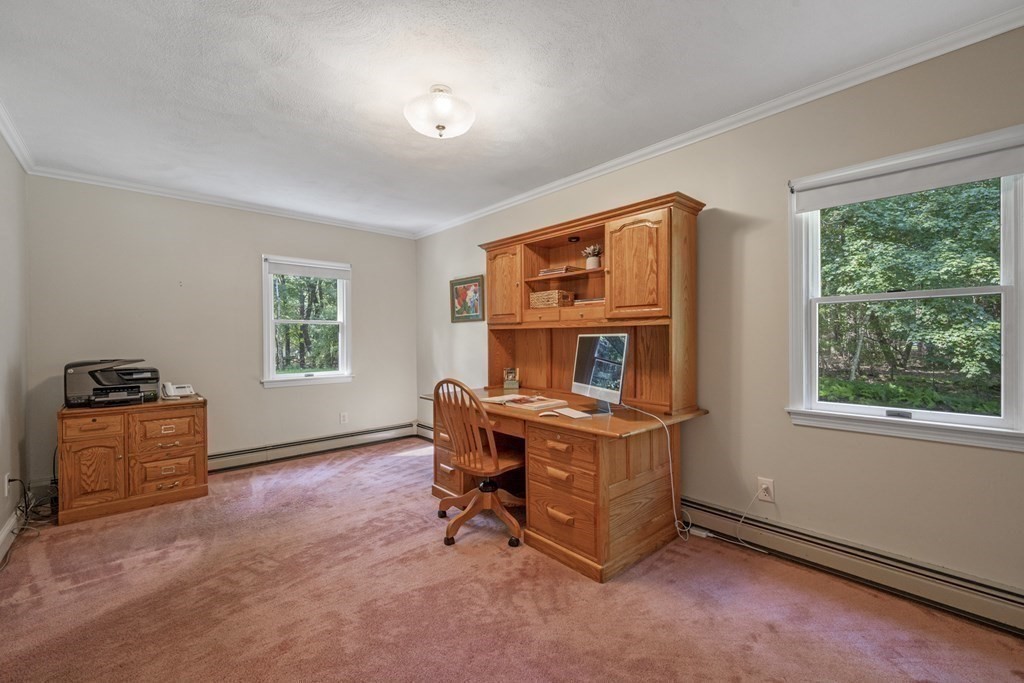118 Herrick Road Boxford, MA 01921 - Photo 24 of 42 a living room with furniture and a fireplace