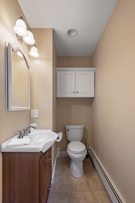 118 Herrick Road Boxford, MA 01921 - Photo 25 of 42 a bathroom with a toilet sink and mirror