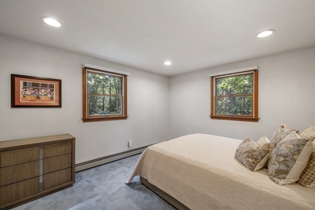 118 Herrick Road Boxford, MA 01921 - Photo 28 of 42 a bedroom with a bed and a window