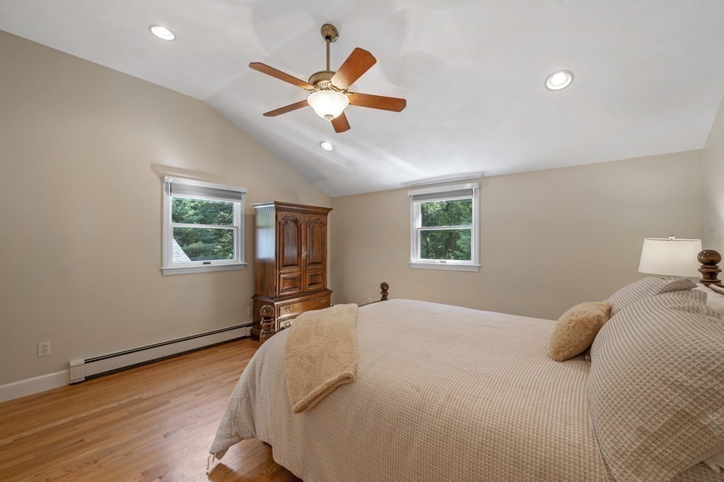 118 Herrick Road Boxford, MA 01921 - Photo 31 of 42 a bedroom with a large bed and a window