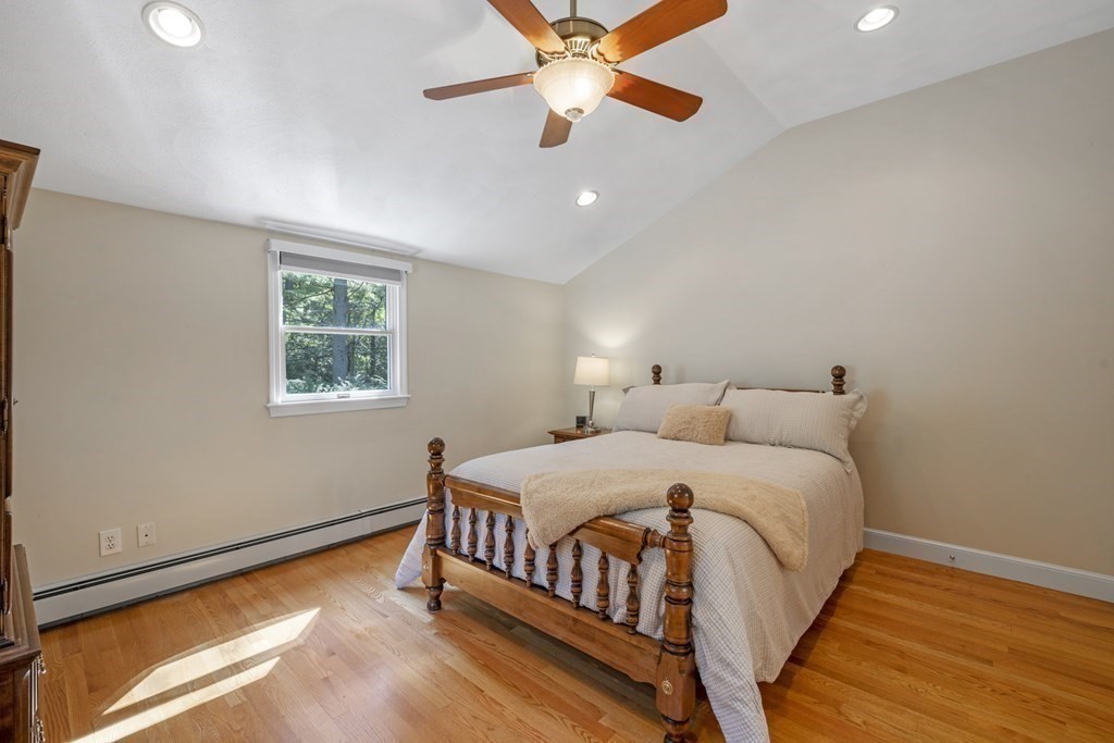 118 Herrick Road Boxford, MA 01921 - Photo 32 of 42 a bedroom with a bed and a window