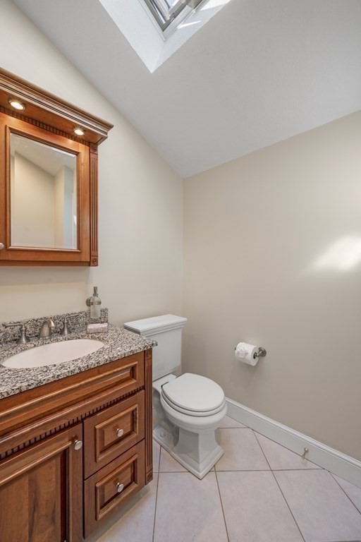 118 Herrick Road Boxford, MA 01921 - Photo 34 of 42 a bathroom with a granite countertop toilet sink and mirror