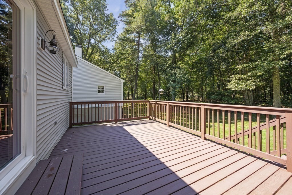 118 Herrick Road Boxford, MA 01921 - Photo 37 of 42 a balcony with wooden floor and fence