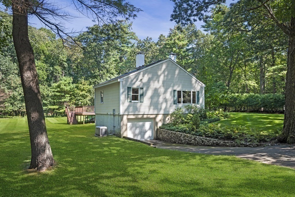 118 Herrick Road Boxford, MA 01921 - Photo 40 of 42 a front view of house with a garden