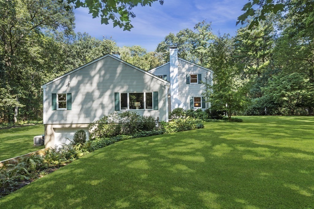 118 Herrick Road Boxford, MA 01921 - Photo 41 of 42 a front view of a house with a yard