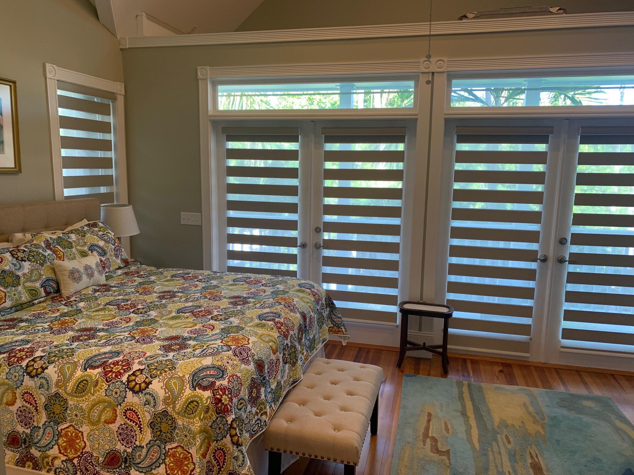 807 Washington Street, Unit 101 Key West, FL 33040 - Photo 16 of 29 a bedroom with a bed and a window