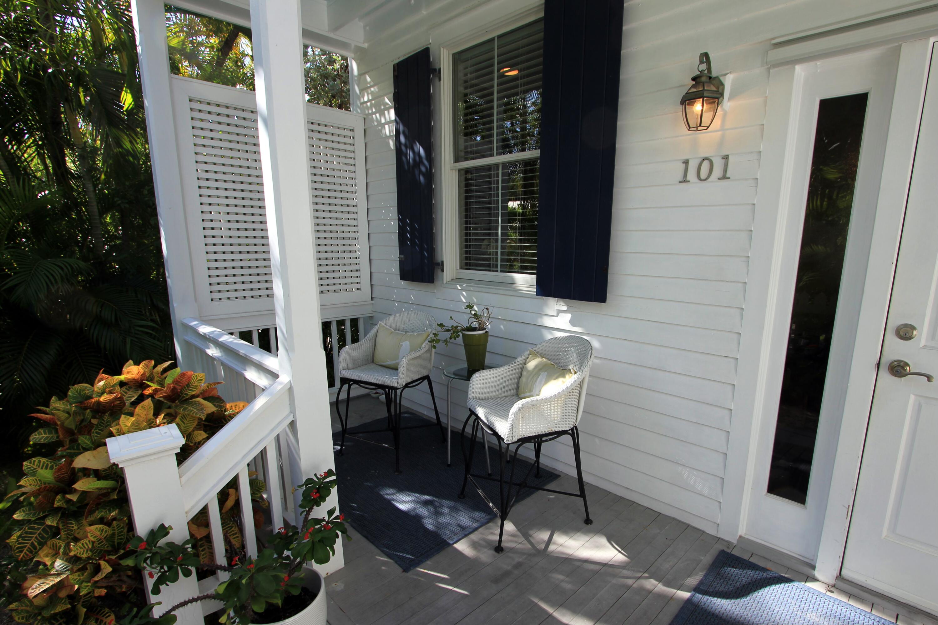 807 Washington Street, Unit 101 Key West, FL 33040 - Photo 2 of 29 a outdoor space with patio furniture
