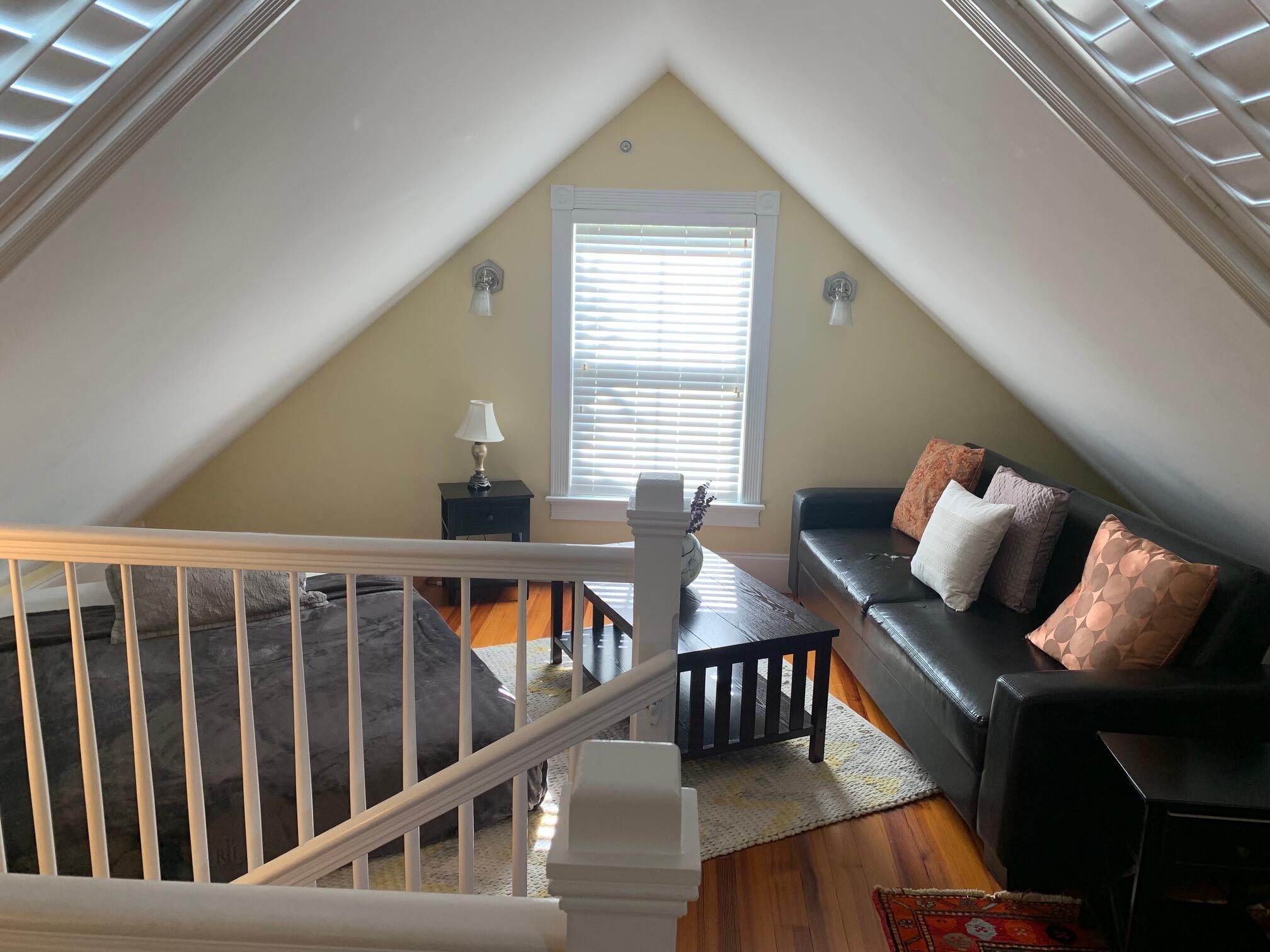 807 Washington Street, Unit 101 Key West, FL 33040 - Photo 25 of 29 a living room with furniture and wooden floor