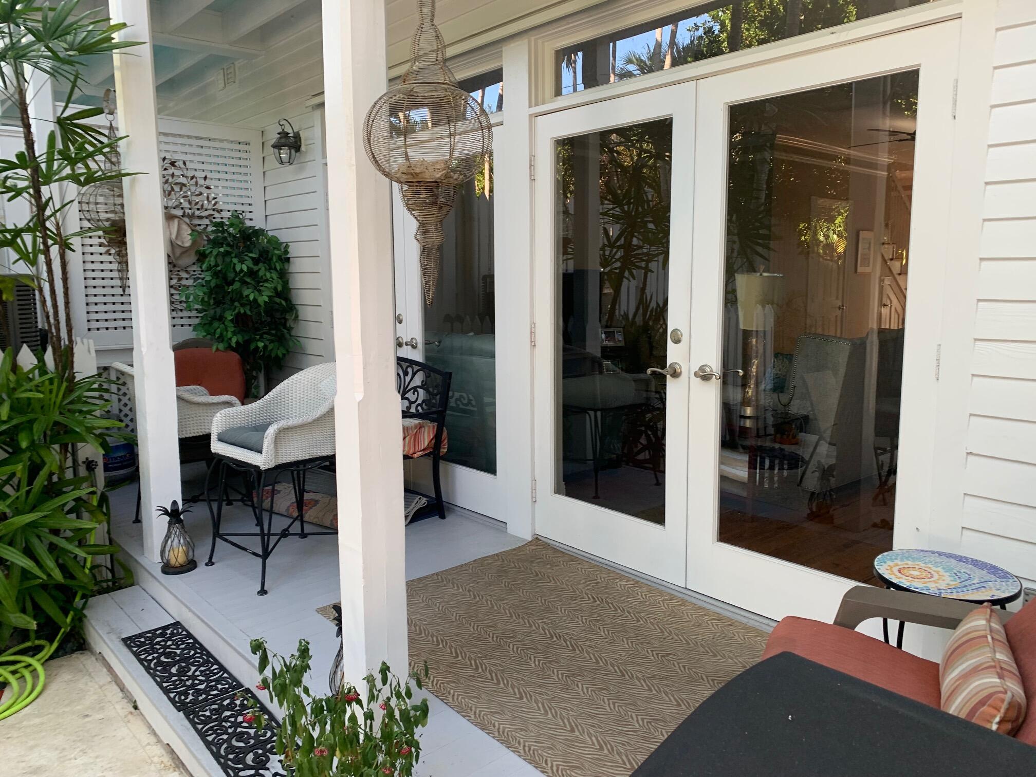 807 Washington Street, Unit 101 Key West, FL 33040 - Photo 4 of 29 a view of living room and patio