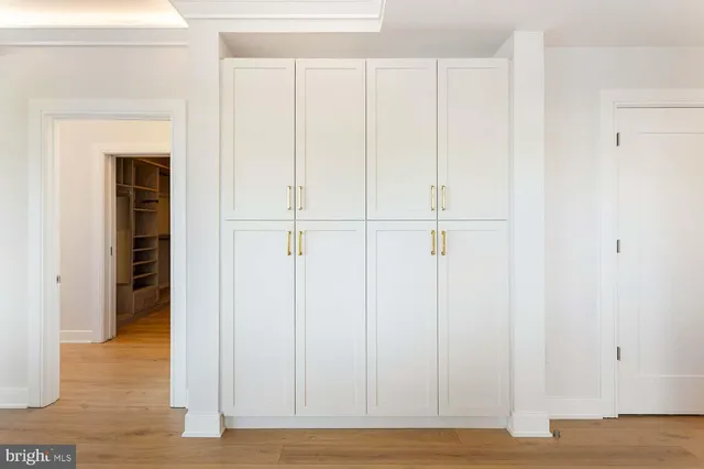 a view of a kitchen from the hallway
