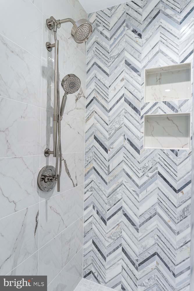 6718 Lowell Avenue, Unit 702 McLean, VA 22101 - Photo 27 of 75 Expansive spa-grade bathrooms