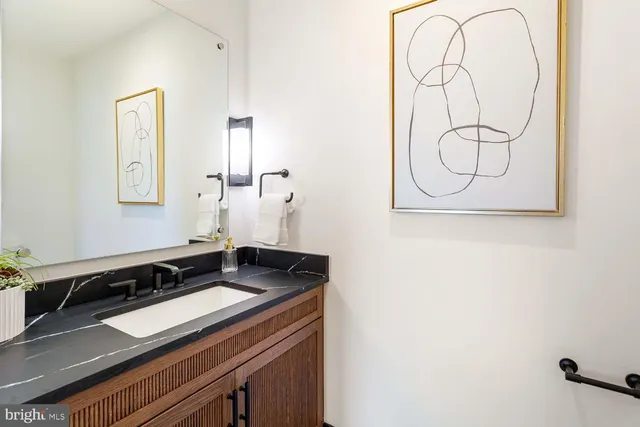 a bathroom with a shower and a bath tub