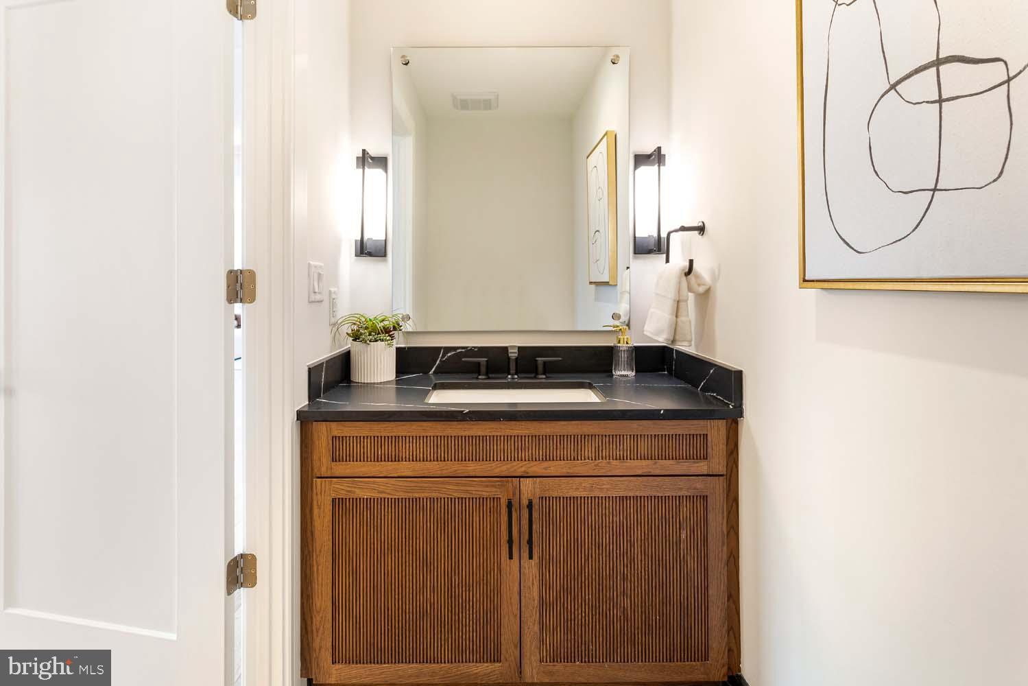 6718 Lowell Avenue, Unit 702 McLean, VA 22101 - Photo 31 of 75 a close view of a utility room with washer and dryer