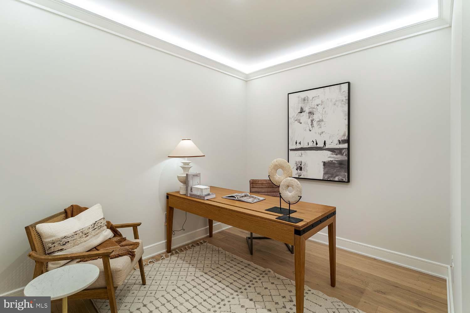 6718 Lowell Avenue, Unit 702 McLean, VA 22101 - Photo 32 of 75 a workspace with furniture and lamp