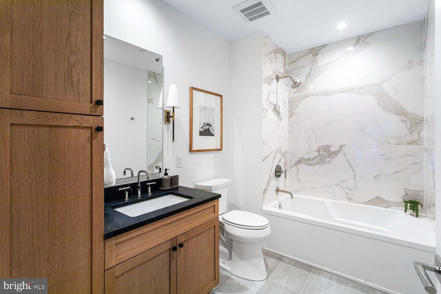 6718 Lowell Avenue, Unit 702 McLean, VA 22101 - Photo 35 of 75 Guest Bathroom