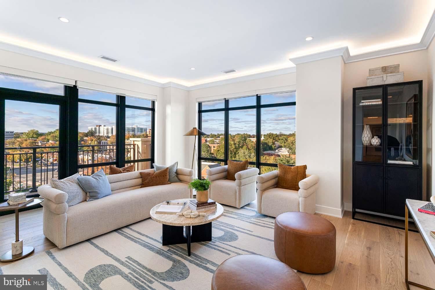 6718 Lowell Avenue, Unit 702 McLean, VA 22101 - Photo 5 of 75 a living room with furniture and a large window