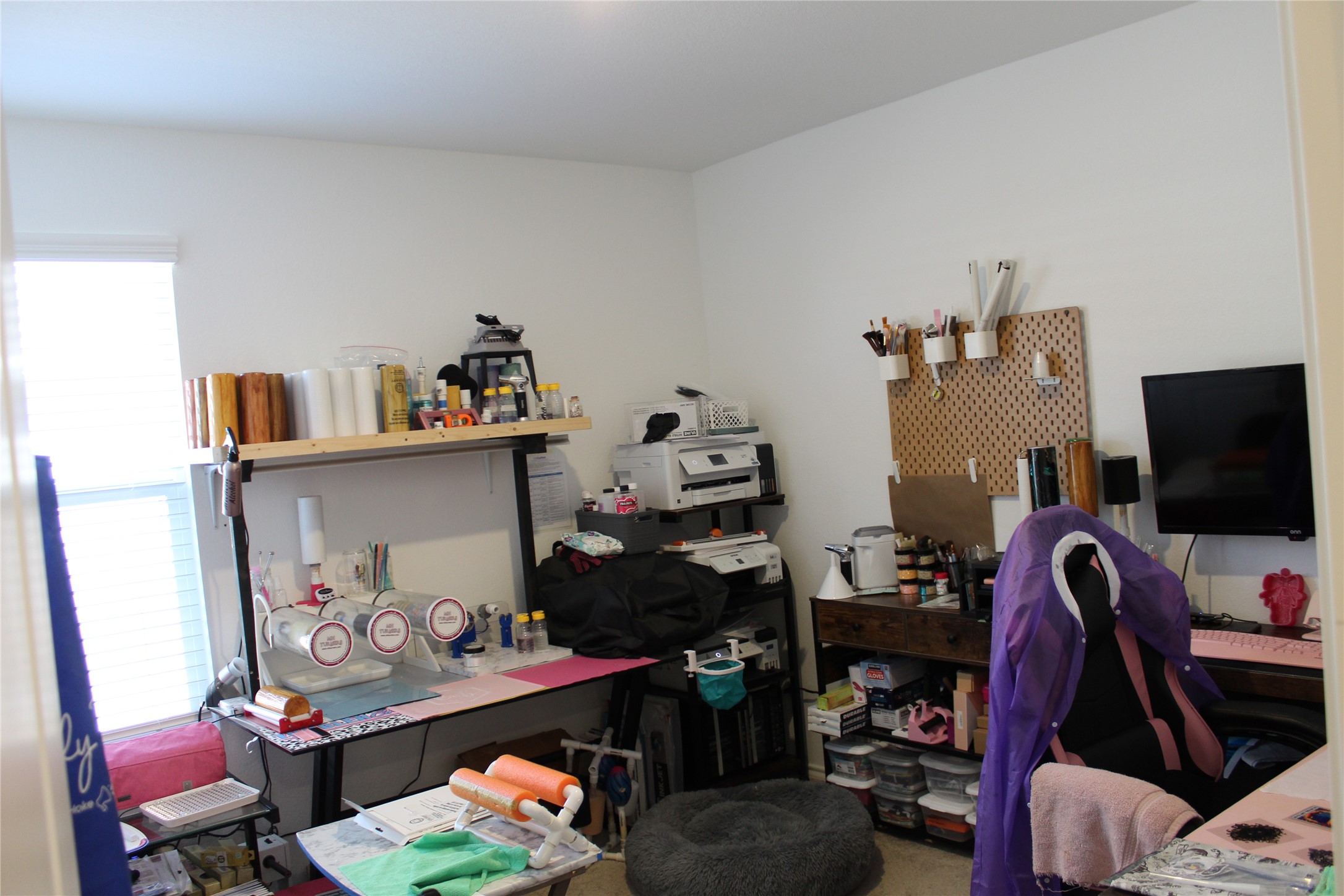 205 Marty Allen Loop Jarrell, TX 76537 - Photo 19 of 22 This bedroom is being used as the craft room, so it has plenty of space for home office or extra spacious room.