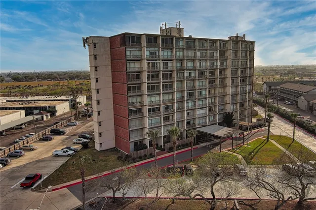 a view of a balcony with a floor to ceiling window