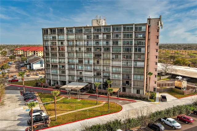 a view of swimming pool with outdoor seating