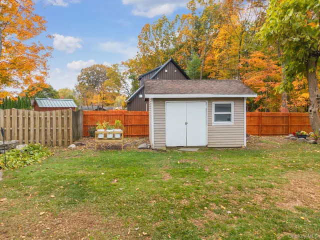 a house view with a garden space