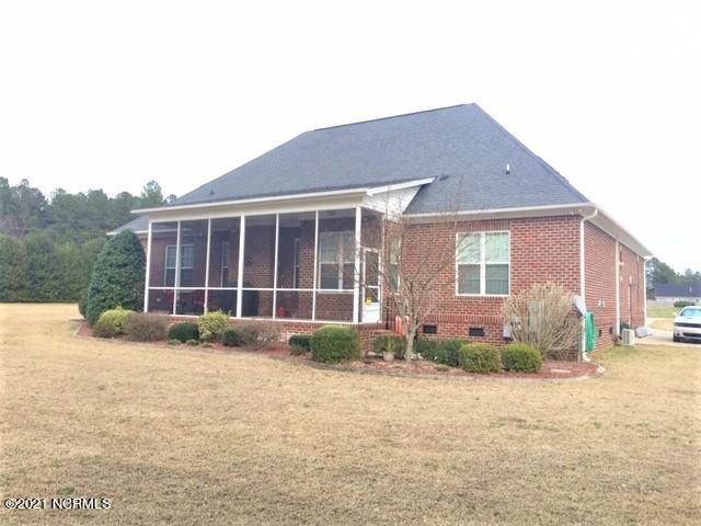 9028 Fox Run Road Bailey, NC 27807 - Photo 20 of 21 9028 Fox Run Rear screen porch (2)