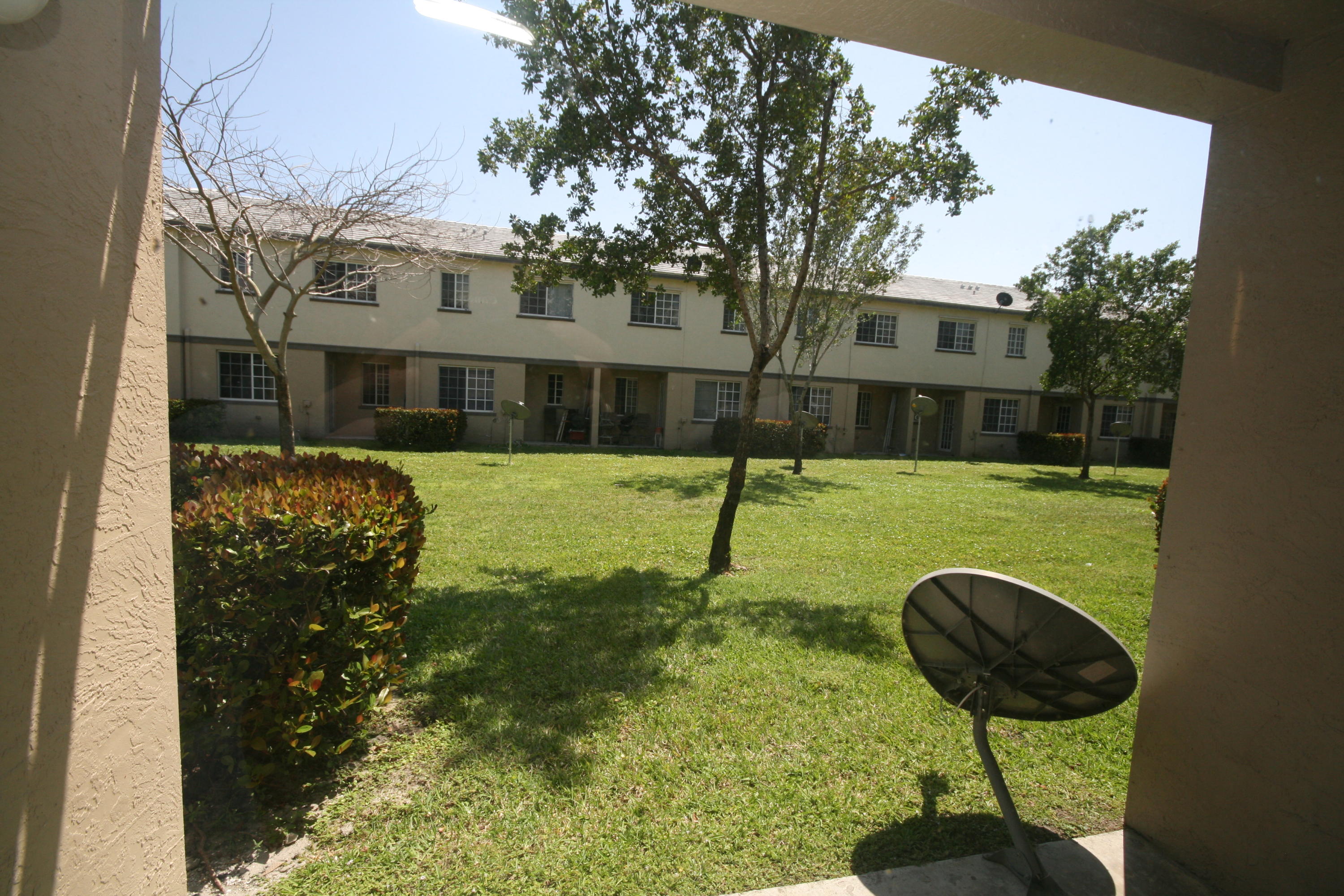 1955 Freeport Drive Riviera Beach, FL 33404 - Photo 1 of 13 Rear View