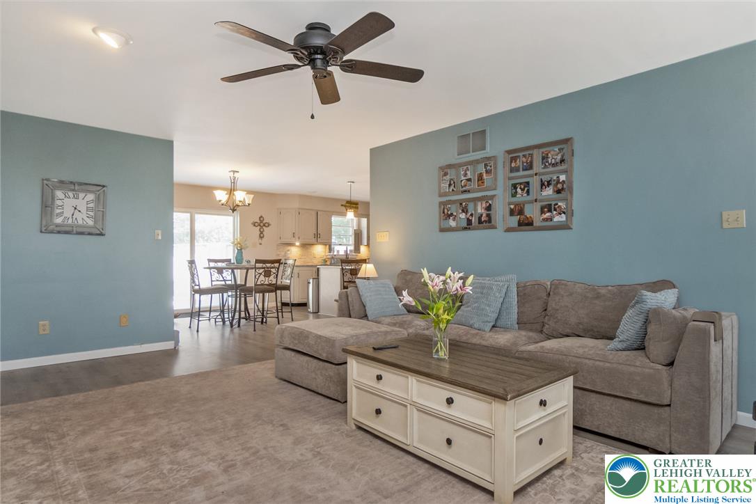 9461 Red Road Kempton, PA 19529 - Photo 55 of 55 An inviting, connected living space showcases an open floorplan with natural light.