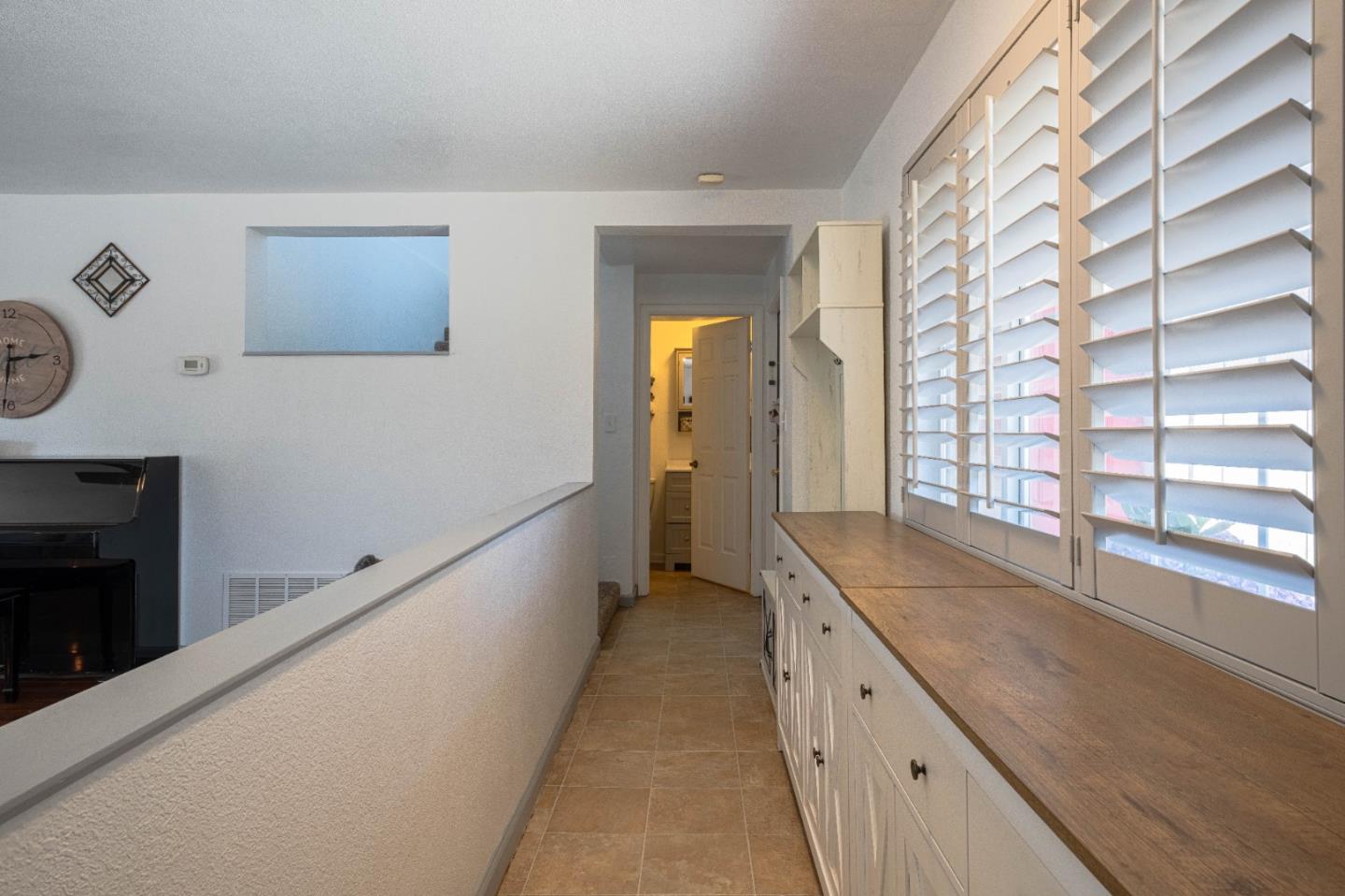 143 Tucker Road Watsonville, CA 95076 - Photo 18 of 42 a bathroom with a granite countertop sink and a large mirror