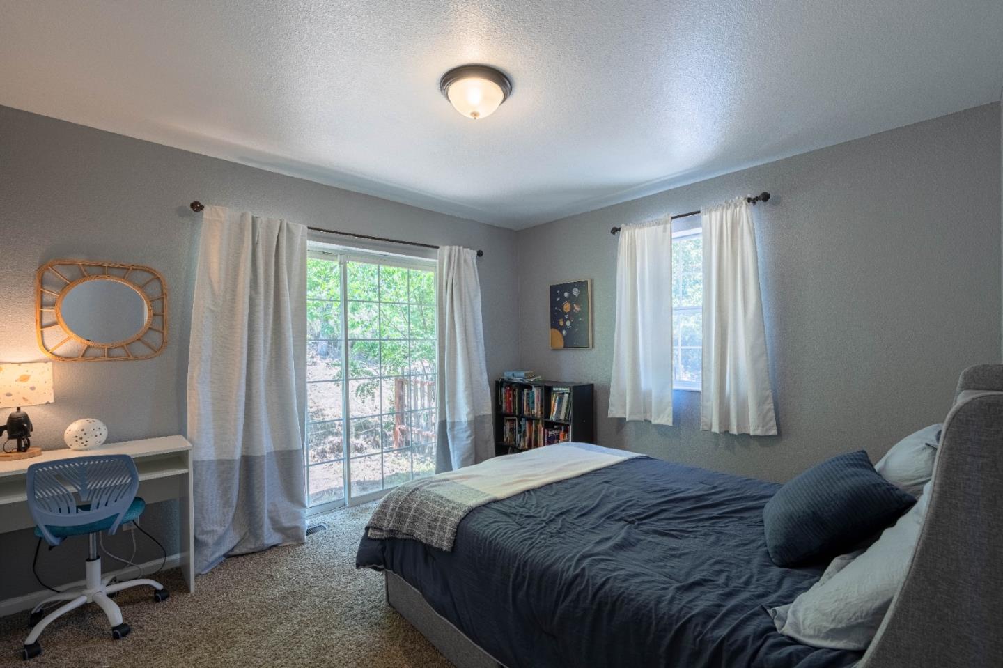 143 Tucker Road Watsonville, CA 95076 - Photo 29 of 42 a bedroom with a bed and a window