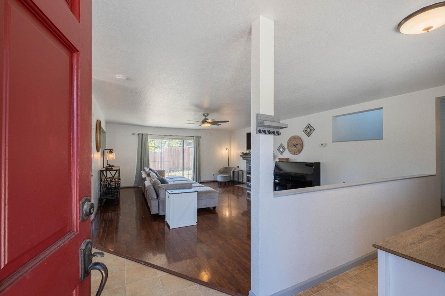 143 Tucker Road Watsonville, CA 95076 - Photo 3 of 42 a view of living room with furniture and wooden floor