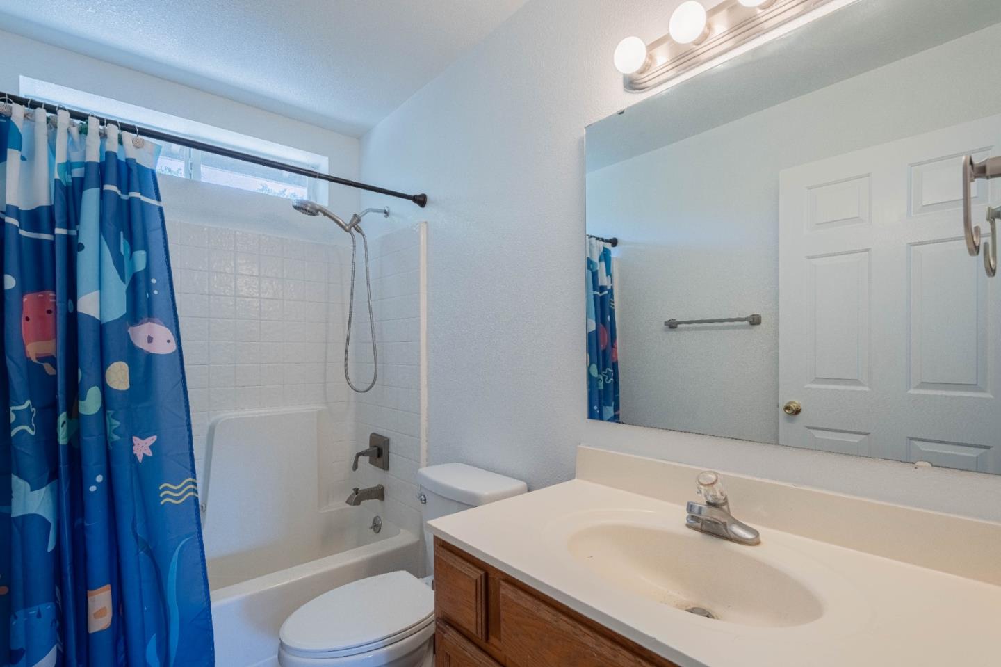 143 Tucker Road Watsonville, CA 95076 - Photo 31 of 42 a bathroom with a sink toilet tub and shower