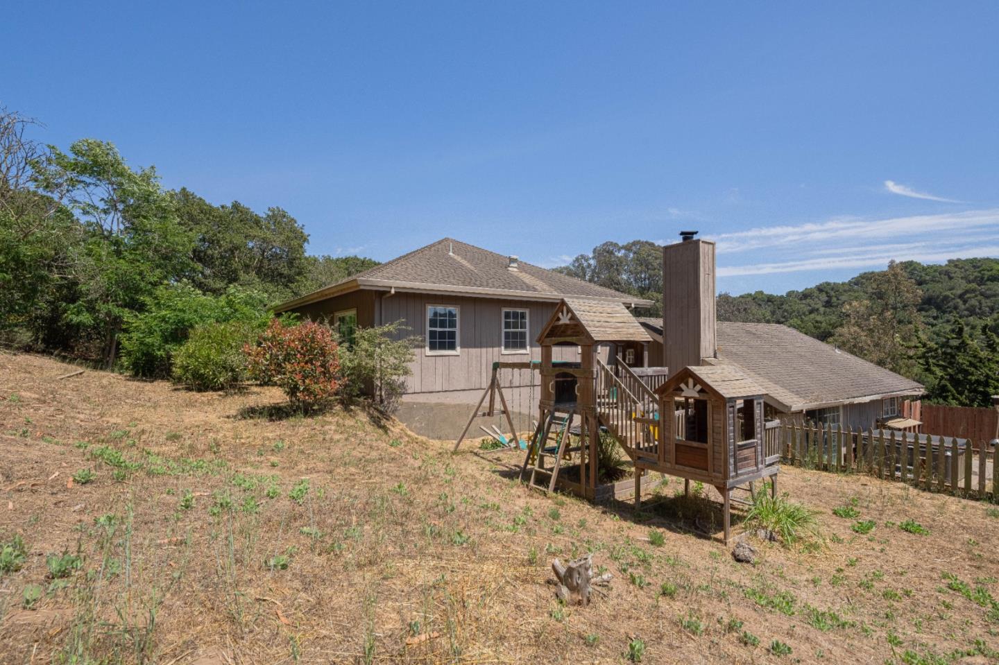 143 Tucker Road Watsonville, CA 95076 - Photo 36 of 42 a view of a house with yard and sitting area