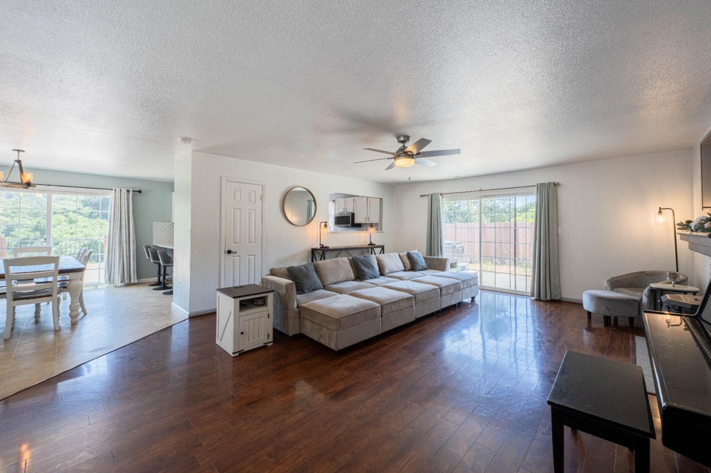143 Tucker Road Watsonville, CA 95076 - Photo 8 of 42 a living room with furniture and wooden floor