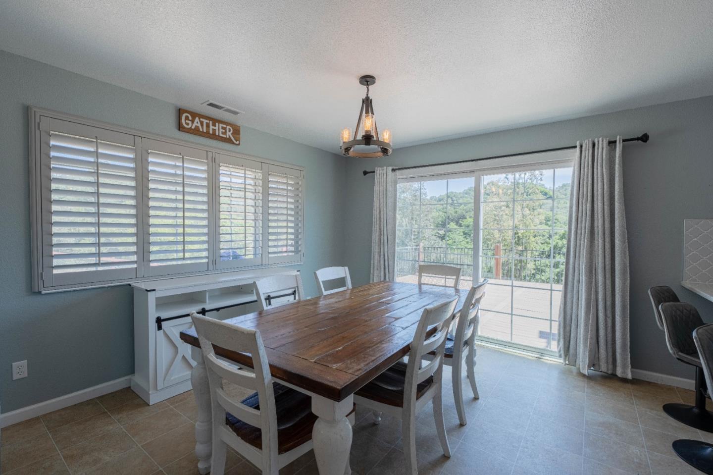 143 Tucker Road Watsonville, CA 95076 - Photo 9 of 42 a view of a dining room with furniture window and outside view