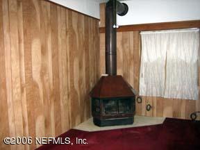 307 Southeast 46th Loop Keystone Heights, FL 32656 - Photo 9 of 10 Woodburning Stove