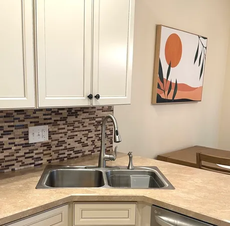 a utility room with washer and dryer