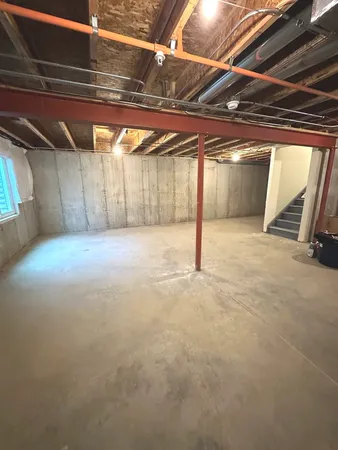 a view of a small house with a white door